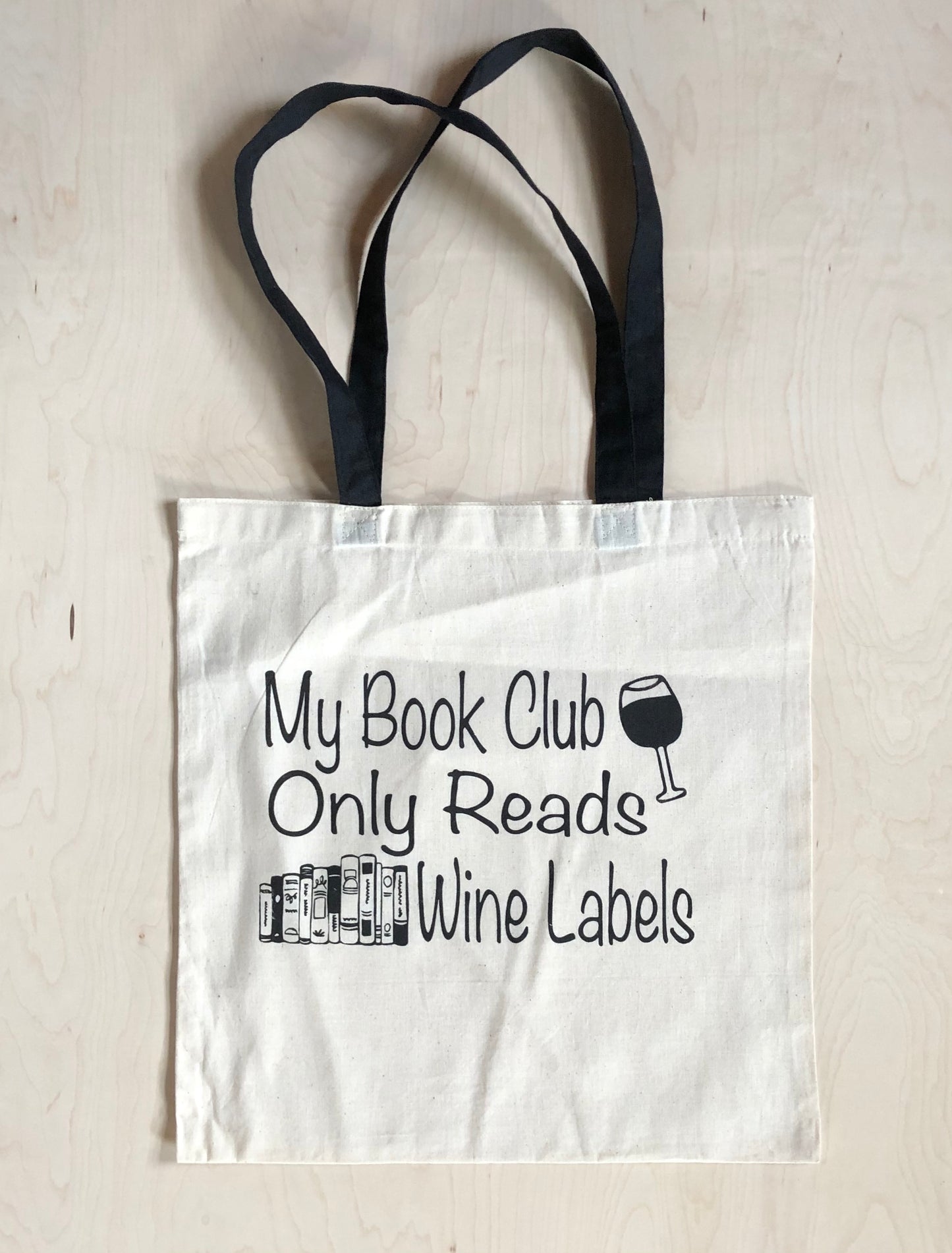“My book club only read wine labels” Tote Bag