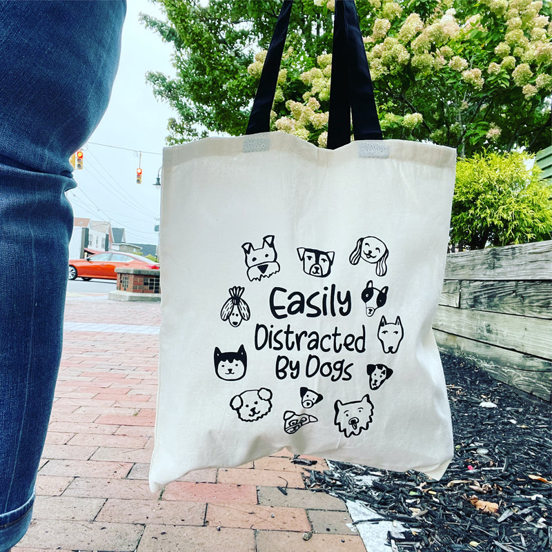 Easily distracted by dogs” Tote Bag